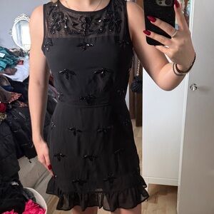 Elegant Black Sequined Mini Dress